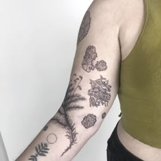 a woman with a tattoo on her arm