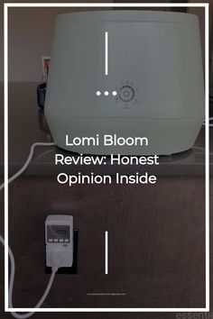 an electronic device on top of a counter with the words loni bloom review honest opinion inside