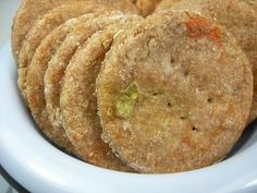 a white plate topped with cookies on top of a table