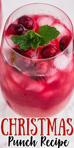 a christmas punch recipe with cherries and mint garnish