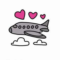 an airplane with hearts flying in the sky