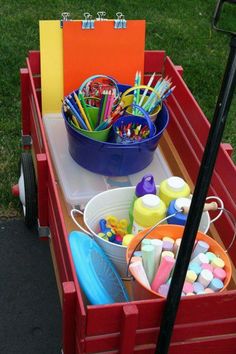 a red wagon filled with lots of different items