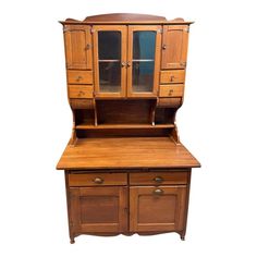 an old fashioned wooden desk with drawers and cupboards on the top, against a white background