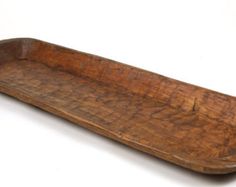 an old wooden tray on a white background