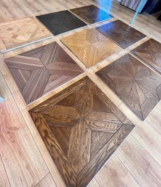 the floor is made up of many different types of wood and has an interesting design