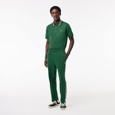 The iconic Lacoste tracksuit, for French elegance on the move. These sweatpants are part of our “Paris” line, inspired by Lacoste tracksuits from the ‘70s, and features a vintage monogram, sporty style, and tailored details. A true essential. Monogram Sweatpants, Lacoste Outfit, Lacoste Tracksuit, Modern Urban Style, Tracksuit Men, Lacoste Sport, Lacoste Men, Sport Chic, Mens Pajamas