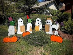 halloween decorations in the shape of ghostes and pumpkins