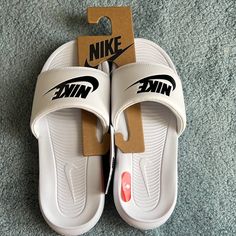 Brand New With Tag. White Round Toe Sandals For Leisure, Casual White Sandals For Leisure, White Flat Slides For Leisure, Comfortable White Sandals For Leisure, White Sneakers For Leisure Summer Activities, White Sneakers For Summer Leisure, White Sneakers For Leisure In Summer, White Slides For Leisure In Spring, White Slides For Spring Leisure