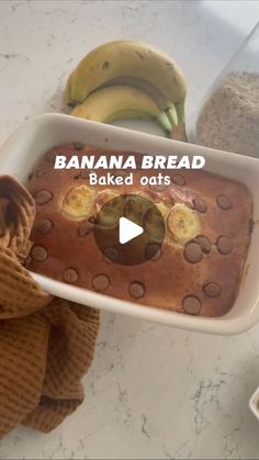 a banana bread baked in a baking dish with bananas on top and the words, banana bread baked oats