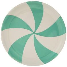 a green and white paper plate with a large candy cane design on the front side