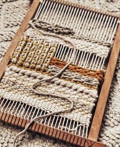 an old weaving loom is being worked on