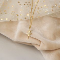 Ballerina Pendant, Gold Ballet slippers, Ballet Necklace for Ballerina Gift, Ballerina necklace, Dancer necklace Our dainty Ballerina necklace is a passionate dancer captured in a miniature charm. Her body dances and strolls around in all its glory with perfect control and strength. Sculpted in sterling silver by hand and set with high craftmanship and attention to detail. - Made in sterling silver, 22 Κ gold plating. - Chain style: Cable  - Chain length: 40 cm or 45 cm (40 cm+5 cm extender)  C Dance Classique, Ballet Shoes Necklace, Ballet Necklace, Ballet Gifts, Ballet Jewelry, Dancer Necklace, Ballerina Necklace, Ballerina Gift, Delicate Gold Jewelry