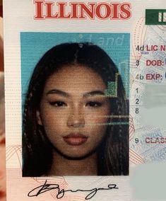 an id card with a woman's face on it