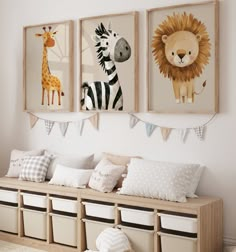 three framed pictures hang on the wall above a wooden bench with storage bins underneath