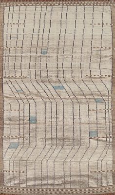 an old rug with blue and brown lines on it