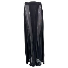 Moschino Couture sheer black wrap front pleated maxi skirt from the 1990s. Sheer black rayon chiffon skirt with a narrow waist band that wraps & closes at the waist front with buttons. The front panels over-lap from the skirt sides to the front. The skirt has stitch down pleats from the side to the side across the back. The skirt is quite transparent. Marked size US8. In excellent wearable condition. All our clothing is dry cleaned and inspected for condition and is ready to wear. Any condition Narrow Waist, Moschino Couture, Sheer Skirt, Pleated Maxi Skirt, Black Wrap, Pleated Maxi, Chiffon Skirt, Gianni Versace, The 1990s