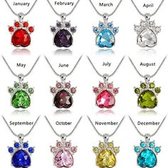 Maya's Grace 12 Months Birthstone Rhinestone Paw Print Pendant For Women The Maya's Grace Paw Print Birthstone Necklace is a beautiful and meaningful accessory, perfect for pet lovers and those who cherish personalized jewelry. Each pendant features a colorful stone corresponding to the birth month, with options including January's Garnet, February's Amethyst, March's Aquamarine, April's Diamond/Crystal, May's Emerald, June's Alexandrite, July's Ruby, August's Peridot, September's Sapphire, October's Tourmaline/Opal, November's Citrine, and December's Zircon/Turquoise. The chain length measures 18" with 2" extension, paw print pendant is 0.71" x 0.94", and the weight is approximately 9g.Jewelry Care: Store in a clean, dry place. Do not wear in water or during sports activities. Clean gentl Paw Print Pendant, Zodiac Sign Fashion, Birthstone Charm Necklace, Paw Print Necklace, Paw Print Charm, Magical Jewelry, Birthstone Pendant, Pet Necklace, Dog Paw