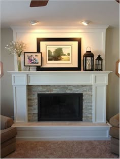 a living room with a fireplace and pictures on the mantle