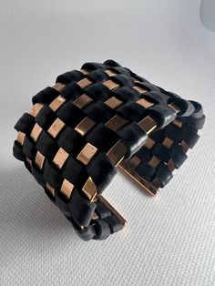 Milor Italy Bronze, Polished Basket Weave Leather Cufflack Leather and Bronze Metal. Beautiful and Unique Womans Cuff. Handmade Black Cuff Bracelet, Black Handmade Cuff Bracelet For Formal Occasions, Formal Black Handmade Cuff Bracelet, Formal Handmade Black Cuff Bracelet, Black Leather Strap Cuff Bracelet, Black Leather Cuff Bracelet For Formal Occasions, Elegant Black Leather Cuff Bracelet, Handmade Black Leather Cuff Bracelet, Designer Black Cuff Bracelet As Gift