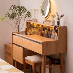 a wooden desk with a mirror, stool and potted plant on top of it