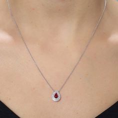 This beautiful Pear Shape Red Ruby With Diamond Halo Necklace is a wonderful gift idea for Christmas, Birthday, Graduation, Valentine's Day and Mother's Day. You can't go wrong with this classic style. The greatest thing about this necklace is that you can adjust the size by yourself. PRODUCT DETAIL: Metal Type: 18K Go Fine Jewelry Red Ruby Necklace, Elegant Ruby Briolette Necklace, Ruby Briolette Necklace In Fine Jewelry Style, White Gold Ruby Necklaces With Brilliant Cut, Fine Jewelry Ruby Briolette Necklace, Fine Jewelry Ruby Teardrop, Red Cubic Zirconia Fine Jewelry Necklace, Ruby Briolette Fine Jewelry Necklace, Ruby Teardrop Fine Jewelry