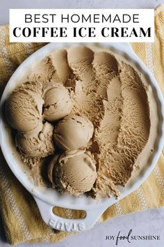 a bowl filled with ice cream on top of a yellow towel