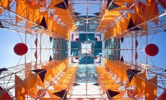 an image of the inside of a building that looks like it is made out of orange and