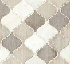 a white and beige wallpaper with an intricate design