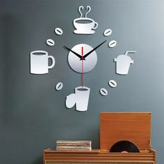 a clock with coffee cups on it in the middle of a room next to a desk