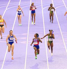 the women's 4x100m relay team is competing in an olympic event