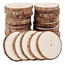 several pieces of wood stacked on top of each other with circles cut out to look like logs