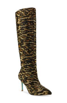 Sparkling crystals create an eye-catching leopard pattern on a knee-high boot that's a surefire way to take your look to the next level. 3 1/4" heel 15 3/4" shaft; 15 1/2" calf circumference Side zip closure Textile upper/synthetic lining and sole Imported Oxford Heels, Fringe Boots, Platform Slippers, Fashion Board, Level 3, Fabric Gift Bags, Crazy Shoes, Leopard Pattern, Mens Fragrance