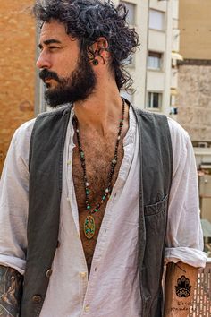 "Very stylish hipster/ Tibetan boho necklace for men made of wooden beads and beautiful bronze pieces from India. Looks amazing both on men and women. The minimum length is 68 cm but there is a chain in the back that adds an extra 5 cm. Feel free to contact me if you want to modify the length. Includes a cool rustic gift wrapping! If you like my style, please have a look at my shop and see if there is something more you like. There are always discount in my shop if you purchase more items.. clic Mens Funky Outfits, Boho Necklace For Men, Man Boho Style, Men's Boho Fashion, Men’s Bohemian Style, Nomad Fashion Men, Witchy Mens Fashion, Men Witch Outfit, Boho Man Outfit