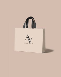 a white shopping bag with black handles and the logo for smooth wear on it's front