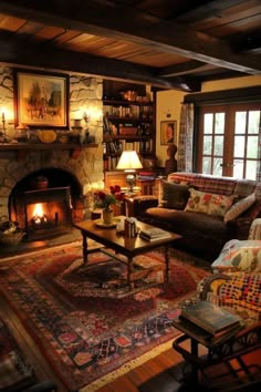 a living room filled with furniture and a fire place