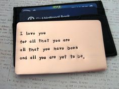 a personalized wallet with a poem written on it