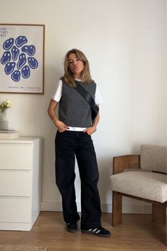 How To Style A Knitted Vest, How To Style Vests For Women, Cool Corporate Fashion, Winter Knit Outfit, Grey Knit Vest Outfit, Black And Grey Clothes, Styling Grey Pants, Grey Work Pants Outfit, Black Work Pants Outfit