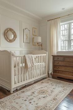 a baby's room with a crib and dresser