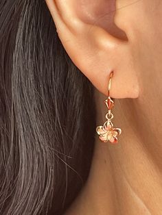 Elegant And Beautiful Hawaiian 14Kt Solid Rose Gold 9mm Plumeria Flower Lever Back Earrings Dangle & Drop Sandblast with a High Polished Edge 14 Karat Solid Rose Gold GUARANTEED, Authenticated with a 14K Stamp Made With Highest Quality Craftsmanship Solid 14K Rose Gold Plumeria Flower Lever Back Earrings Dangle & Drop Total Weight 1.7 grams Solid 14K Rose Gold Plumeria Flower Width 9 Millimeters Length 9 Millimeters Dangle & Drop Length 26 Millimeters Amazing Gift For Family and Friends! Jewelry Rose Gold Flower-shaped Single Earring, Rose Gold Flower Shaped Single Earring, Rose Gold Single Flower Earring, Round Rose Gold Flower Charm Earrings, Rose Gold Round Flower Charm Earrings, Rose Gold Flower Charm Earrings, Rose Gold Dangle Earrings With Flower Charm, Rose Gold Flower-shaped Earrings With Ear Wire, Rose Gold Flower Shaped Earrings