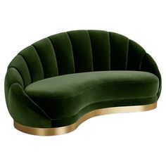 an oval shaped green couch with gold trimmings and a curved back, sitting in front of a white background