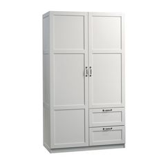 a white armoire with drawers and doors