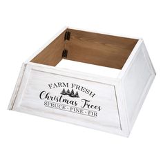 a white wooden box with the words farm fresh christmas trees spice and fire on it