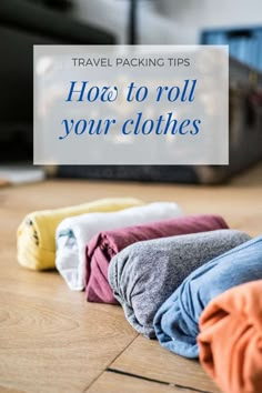 travel packing tips how to roll your clothes on the floor with text overlay that reads, travel packing tips how to roll your clothes