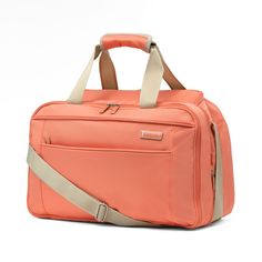 an orange duffel bag on a white background