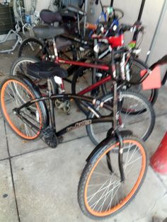 three bikes are parked next to each other