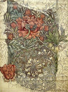 a drawing of flowers and leaves on a piece of paper with an intricate design in the middle