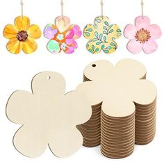 wooden flower cutouts and tags on a white background