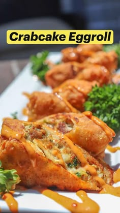 some food is laying out on a white plate with the words crabcake eggroll