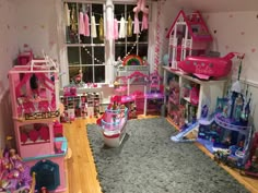 a room filled with lots of toys and furniture