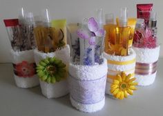 there are many different types of toiletries in these baskets on the table, one is decorated with flowers and butterflies